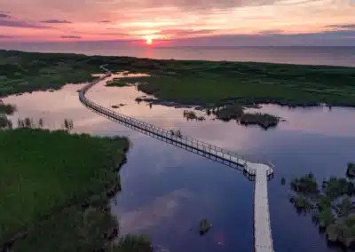A Beautiful Boardwalk With Sunset Made By Regatta Docking Services In North Charleston