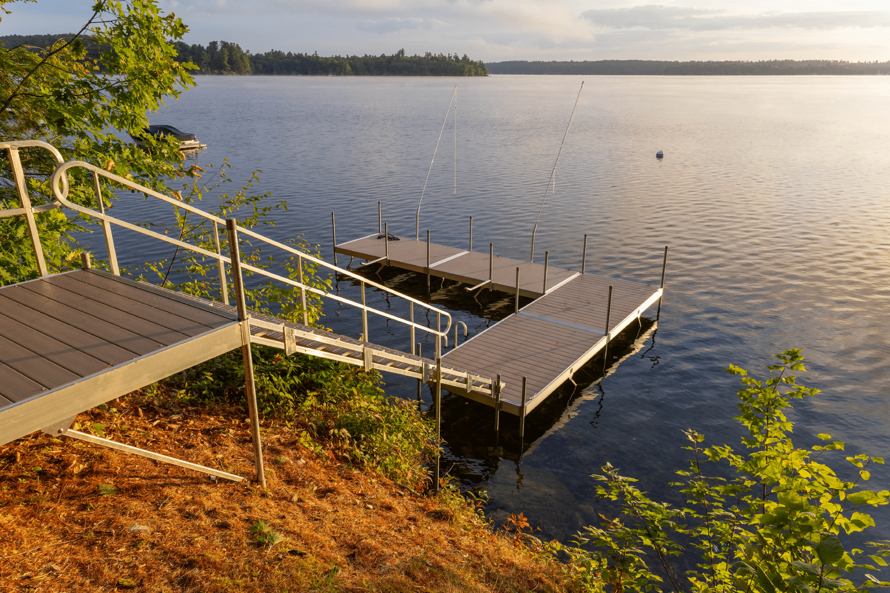 Roll-In Aluminum Dock Sections On A Calm Lake.